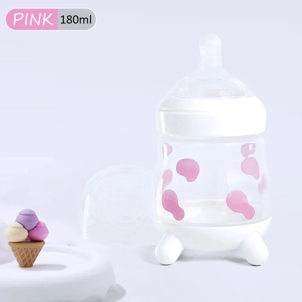 180ML/270ML cute cow shaped anti bloating baby PP bottle without handle, silicone replacement nipple available for sale